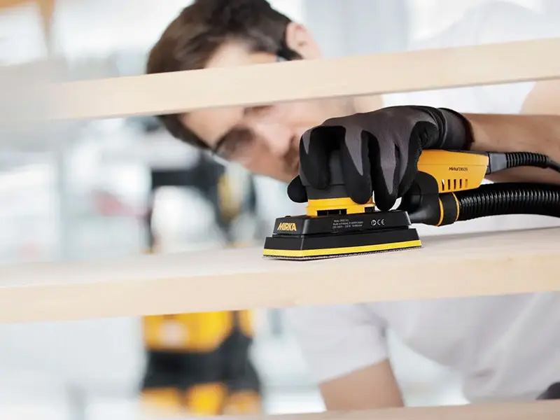 Mirka DEOS 353CV sanding wooden frame detail work