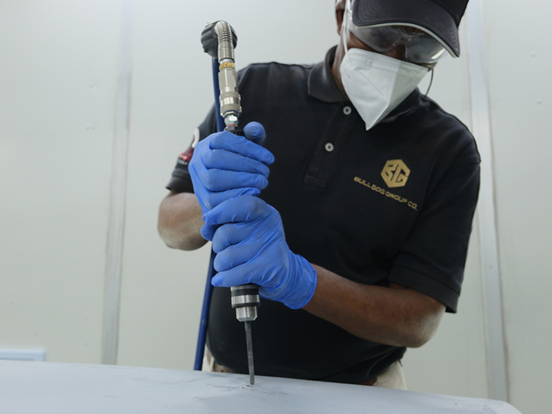Technician using Hsutech keyed chuck air drill head on multi tool body